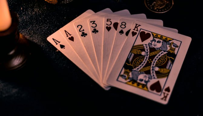 Captain's Bounty game interface showing treasure theme and spin controls